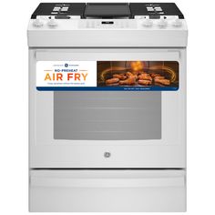 a white stove with an air fry sticker on the front and back cover over it