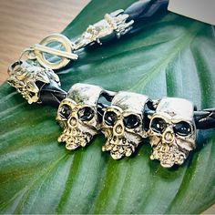 Silver Tone Toggle Skull Trio Bracelet Silver Skull Bracelet With Black Leather Strap #Gothicjewellery #Skullaccessories One Size J001 Skull Accessories, Skull Bracelet, Gothic Jewelry, Bracelet Silver, Silver Bracelets, Womens Jewelry Bracelets, Women's Jewelry, Black Silver, Leather Straps