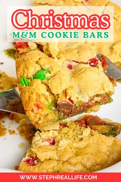 christmas m & m cookie bars on a white plate with a red and green sign