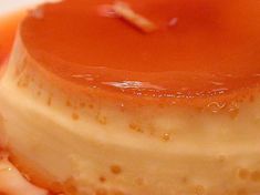 a close up view of a cake with orange icing