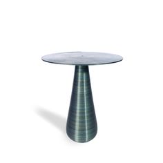 a round glass table with a metal base on an isolated white background for use as a centerpiece