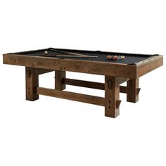 the pool table is made from wood and has two cues on it