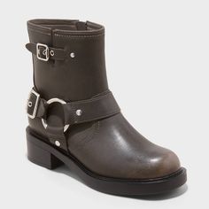 Elevate your boot collection with these Connor Harness Buckle Ankle Boots from Universal Thread™. Made from faux leather, these boots are designed with a round closed toe and harness straps accented with silver-tone buckles, nail heads and a ring for lending stylish moto flair. They sport a side zipper closure for a smooth fit and boast a cushioned footbed and soft fabric lining for all-day comfort, complemented by a 1.75-inch block heel that adds height. Universal Thread™: Found exclusively at Target Boots, Heel Combat Boots, Beach Socks, Boot Collection, Chelsea Rain Boots, Western Ankle Boots, Vegan Boots, Buckle Ankle Boots, Harness Boots