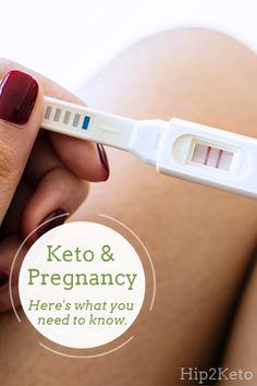 a woman is holding a thermometer in her hand