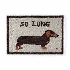 a door mat with a dachshund on it that says, so long