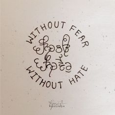 the words without fear are written in cursive writing on a white paper background