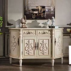 an ornately decorated sideboard in a living room