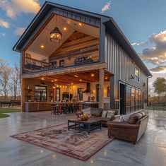 a large open floor plan with an outdoor living area and dining room in the background