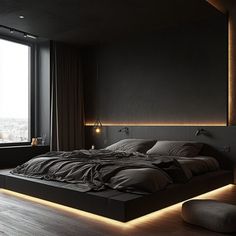 a large bed sitting in a bedroom next to a window with lights on the side