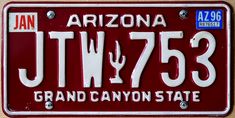 a red arizona license plate with the word jtw7353 on it