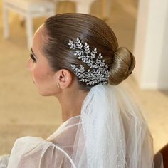 Elevate Your Bridal Look with our Emily Hair Wings. Rhodium Plated for Long-Lasting Durability and made with Swarovski Crystals for that extra Sparkle. Style one as a Side Piece or Double Up for Some Stunning Bridal Wings - Your Look, Your Way. Bridal Hair Bun, Leaf Hair Piece, Hair Wings, Hair Piece Wedding Hair, Hair Piece Wedding, Bridal Hair Buns, Bride Hair Accessories, Wedding Leaves, Double Up