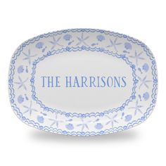 a blue and white platter with the words, the harrisons written on it