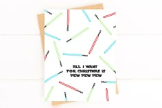 a greeting card with the words, all i want for christmas is pew pew few