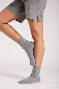 Meet the coziest shorts out there. With a mid-rise drawstring waist and sleek silhouette, these ultra-flattering, 100% cashmere shorts are the softest way to show some leg. Waffle-knit weave and we didn't forget the pockets. There are three total. – Loose, relaxed fit– Drawstring closure– Waffle knit– 100% CashmereSIZE & FITModel measurements: 5'6" tallModel is wearing US size Small Cashmere Shorts, Cable Knit Socks, Cashmere Pants, Cashmere Socks, Soft Sock, Drawstring Shorts, Pull On Pants, Tall Model, Waffle Knit