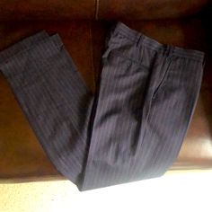 Excellent Condition Wool-Silk Linen, Italian Fabric, Made In Portugal. Perfectly Tailored Quality In This Great Pair Of Pants. These Stylish Pinstripe Pants Are Lightweight And Are Perfect With A Dress Shirt And Shoes, No Tie Needed. They Also Pair Well With A Summer Camp Or Polo Shirt And Loafers. No Flaws, Tears, Or Imperfections. They Measure W31 L34. Cuffed At The Ankles. A Classic Look For Work, Leisure, Or Date Night. This Luxury Dress Pants Priced Well Below Their Worth. Make An Offer Now Classic Silk Straight Dress Pants, Tailored Silk Tapered Leg Bottoms, Tailored Silk Bottoms With Tapered Leg, Tailored Straight Leg Silk Bottoms, Tailored Silk Straight Leg Bottoms, Classic Silk Dress Pants With Straight Leg, Classic Silk Straight Leg Pants, Silk Straight Leg Bottoms, Classic Silk Straight Leg Dress Pants