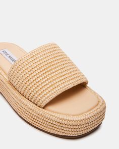 The BEACHY square toe sandal secured a woven raffia wrapped flatform sole with a matching wide slide strap for a super comfy textured look. Square toe flatform slide sandal Slip-on style Woven raffia wrapped sole 1.5 inch heel height Raffia upper material Textile lining Vegan leather sock Synthetic sole Imported Sorority Rush Outfits, Square Toe Sandals, Woven Raffia, Leather Socks, Platform Slides, 5 Inch Heels, Casual Sandals