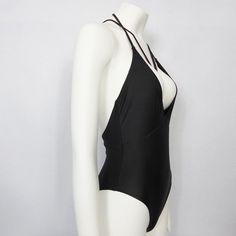 Material: Lycra, Nylon, SpandexWith Pad: No High Stretch Leotard For Beach, Solid High-stretch Beach Leotard, High Stretch Solid Leotard For Beach, High Stretch Solid Color Leotard For Beach, Solid Color Stretch Backless Leotard, Stretch Backless Bodysuit For Poolside, Black Stretch One-piece For Pool, Black Stretch One-pieces For Pool, Stretch One-piece Club Outfit