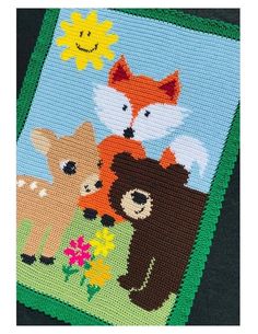 a cross stitch picture with animals in the grass and flowers on it's border