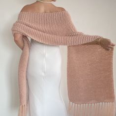 Wedding blush pink shawl This versatile blush pink wrap piece not only complements any outfit but also provides warmth and protection from the chilly weather throughout fall, winter, and spring.  These cover up's make an excellent bridesmaid gift. Fuzzy and warm yarn. it is not itchy at all.  My proucts are handmade. MATERİAL: 10% mohair, 10% wool, 80% premium acrylic-Polyamid, COLOR:BLUSH PİNK (AS SHOWN)  MEASUREMENTS: (Average) Length: 67'' (170 CM) Width:20'' (50 CM)  (without fringes)  If yo Pink Shawl Scarves For Fall, Pink Shawl Scarf For Fall, Bohemian Pink Shawl For Winter, Pink Bohemian Shawl For Winter, Winter Bohemian Pink Shawl, Pink Elegant Scarf For Fall, Pink Bohemian Shawl For Wedding, Winter Wedding Shawl Scarf, Elegant Pink Shawl Scarves