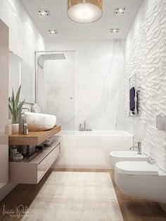 a white bathroom with two toilets and a bathtub