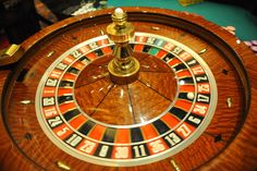 a spinning roule on top of a wooden table