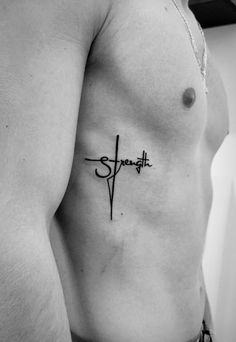 a man with a cross tattoo on his chest and the word strength written in cursive writing