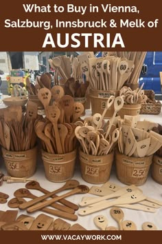 wooden spoons and utensils are arranged on a table with the words, what to buy in vienna, saaburg