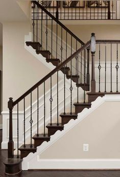 an empty room with a stair case in it