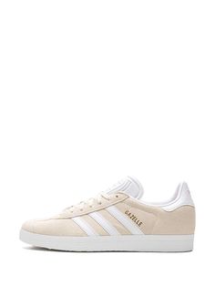 Adidas Gazelle "Off White" Sneakers - Farfetch Classic Adidas Sneakers With Vulcanized Sole, Classic White Adidas Custom Sneakers, Classic Cream Sneakers For Streetwear, Adidas Classic Custom Sneakers With Gum Sole, Classic Adidas Custom Lace-up Sneakers, White Suede Skate Shoes With Laces, Classic Cream Sneakers With Laces, Classic Cream High-top Sneakers, Classic Adidas Lace-up High-top Sneakers