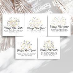 three new year's greeting cards with gold fireworks