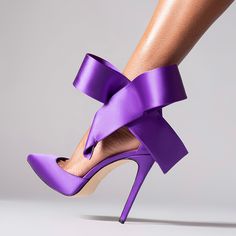 Step into elegance with these Elegant Purple Ankle Strap Bow Heels. Designed with a pointed toe and satin finish, these pumps are perfect for weddings and special occasions. Material: Satin Color: Purple Heel Type: stiletto heel Heel height: 4.72" / 120 mm approx Product measurements were taken using size 8. Please note that measurements may vary by size. Toe: Pointed toe Bow embellishment The ankle strap design makes it easier to wear. Handcrafted US sizing. Fits true to size. Purple Heels, Bow Pumps, Bow Sandals, Bow Heels, Stiletto Shoes, Purple Satin, Satin Color, Handbag Shoes, High Heels Stilettos