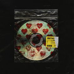 a cd cover with hearts on it and the words, january 11th amo bring me the horizon