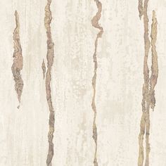 the wallpaper is white and brown with gold streaks on it's surface,