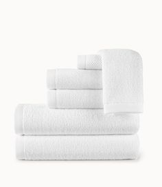 white towels stacked on top of each other