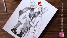 a drawing of two people hugging each other on top of a piece of paper next to a