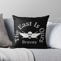 the east is ourss braves throw pillow