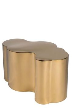 a gold coffee table with an oval shaped top and two curved sides, on a white background