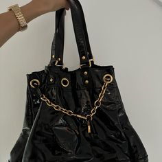 Ysl, Yves Saint Laurent Black Croc Embossed Patent Leather Tote Bag With Lock And Key Charms, Gold Accents Luxury Black Shoulder Bag With Engraved Logo, Ysl Black On Black Bag, Chic Black Shoulder Bag With Gold-tone Logo Plaque, Ysl Black And Gold Bag, Saint Laurent Black Tote Bag, Key Charms, Yves Saint Laurent Bags, Lock And Key, Leather Tote Bag