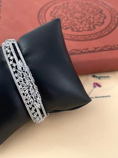 Almost a diamond bracelet, high quality. It's openable bracelet with a hook . It will fit size 2.2 to 2.6 easily .  The elegant design makes it perfect for dressing up your style, adding a radiant touch of glamor to your collection. Price is for one bangle/ kada  Two option available silver and gold plating. Ad Bangles, Wedding Jewelry Indian, Boutique Decor, Bracelet Diamond, Cz Bracelet, Indian Wedding Jewelry, Jewelry Indian, Diamond Bracelets, Look Alike