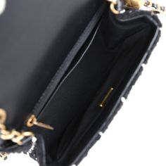 This Pearl Crush Mini Square flap bag is of multicolor tweed with antique gold tone hardware and has a front flap with signature CC turnlock closure, rear half moon pocket, single interwoven black leather and antique gold tone chain link shoulder/crossbody strap with adjustable "pearl" ball.The interior is lined in black leather and features a zipper pocket with Chanel pull and an open pocket below.Collection: 23KOrigin: ItalyCondition: Pristine; new or never wornAccompanied by: Chanel box, Chanel dustbag, carebook, ribbon and retail UPCMeasurements: 6.5" width x 5.5" height x 3" depth; 22.5" strap drop Jewelry Gift Guide, Chanel Box, Chanel Pearls, Chanel Mini, Black Tweed, Bottega Veneta Shoulder Bag, Hermes Bags, Flap Bag, White Bag