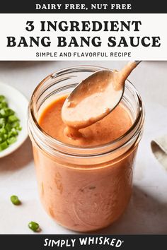 a spoon full of sauce with the text 3 ingredient bang bang sauce simple and flavorful recipe