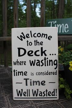 a welcome sign to the deck where washing time is considered time well wasted