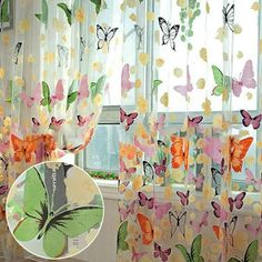 the curtains are decorated with butterflies on them