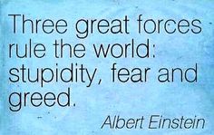 albert einstein quote about force and greed on blue paper with black ink in the center