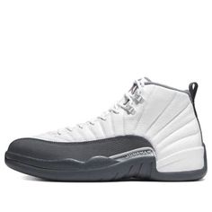 The Air Jordan 12 Retro 'Dark Grey' blends classic style with a modern aesthetic. The white, grey and red colorway is inspired by Japan's Rising Sun Flag, and the ribbed upper is made of leather and nubuck for a comfortable fit. (SNKR/High Top/Basketball/Shock-absorbing) Jordan 12 Shoes, Rising Sun Flag, Retro Basketball Shoes, Nike Retro, Air Jordan 12, Air Jordan 12 Retro, Marina Blue, Jordan 12 Retro, Jordan 12