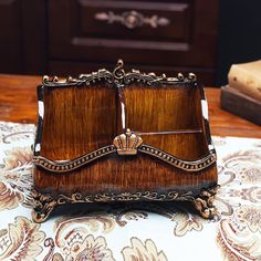 a wooden box sitting on top of a table