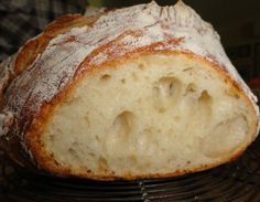 a loaf of bread sitting on top of a cooling rack