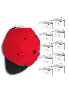 a red hat with black dots on it and six white boxes behind it, all lined up in rows