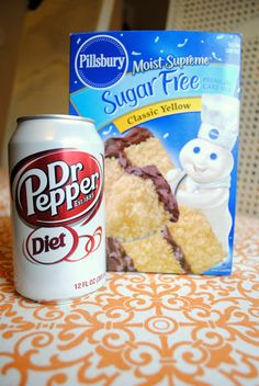 a can of dr pepper next to a box of sugar free cake