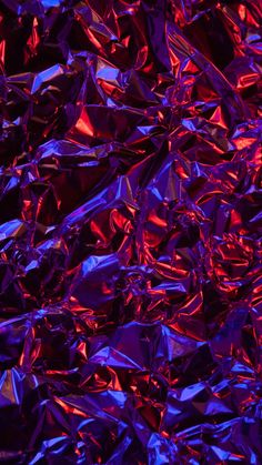 purple and red tinfoiled material is shown in close up view with no image to describe